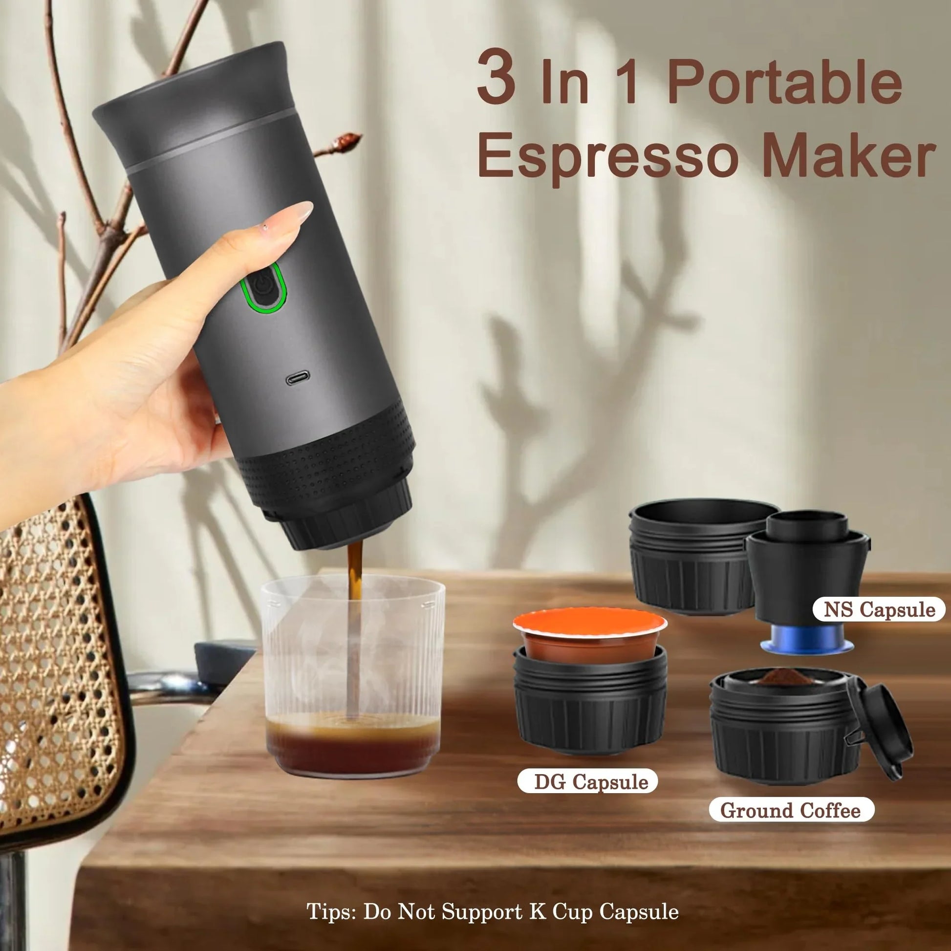 3-in-1 portable espresso maker being used to pour coffee into a glass, with various capsule types displayed on a wooden surface.