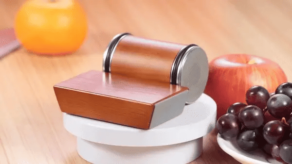 Magnetic Rolling Knife Sharpener on kitchen counter with wooden roller design for easy precision knife sharpening